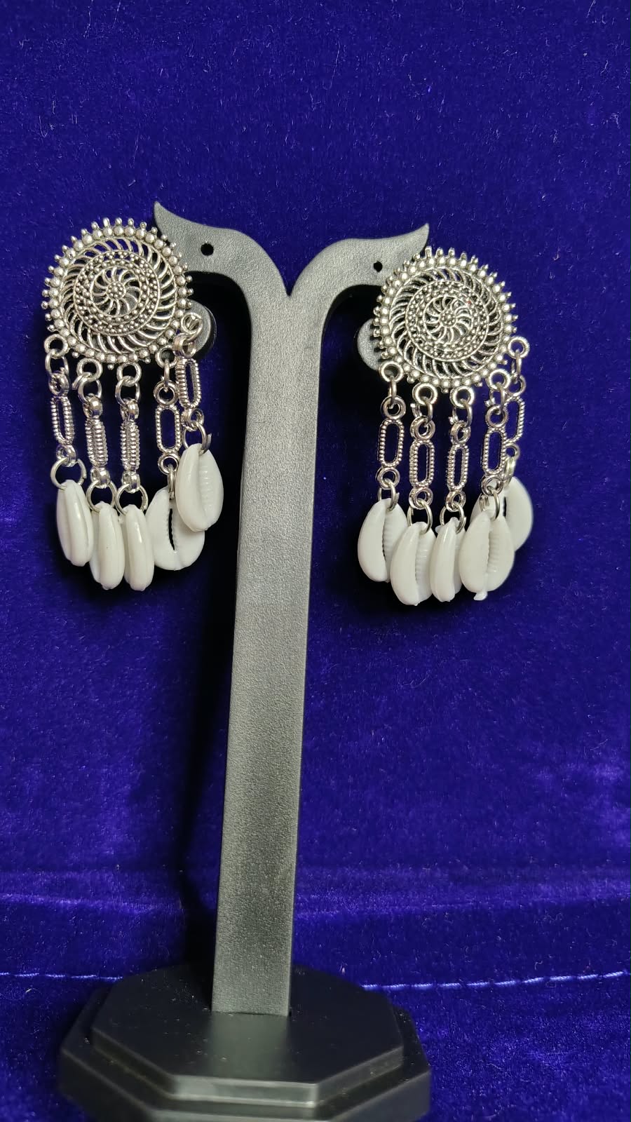 Oxidized Spiral Cowrie Shell Earrings - Close Up